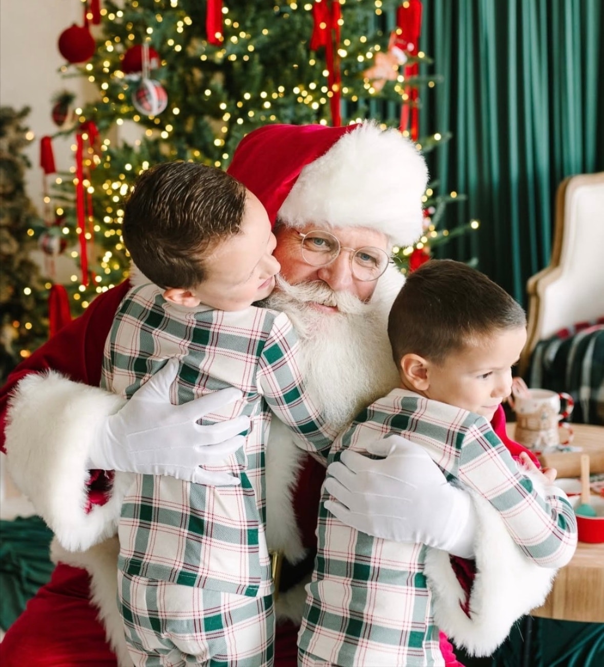 Family photo with Santa by the Christmas tree