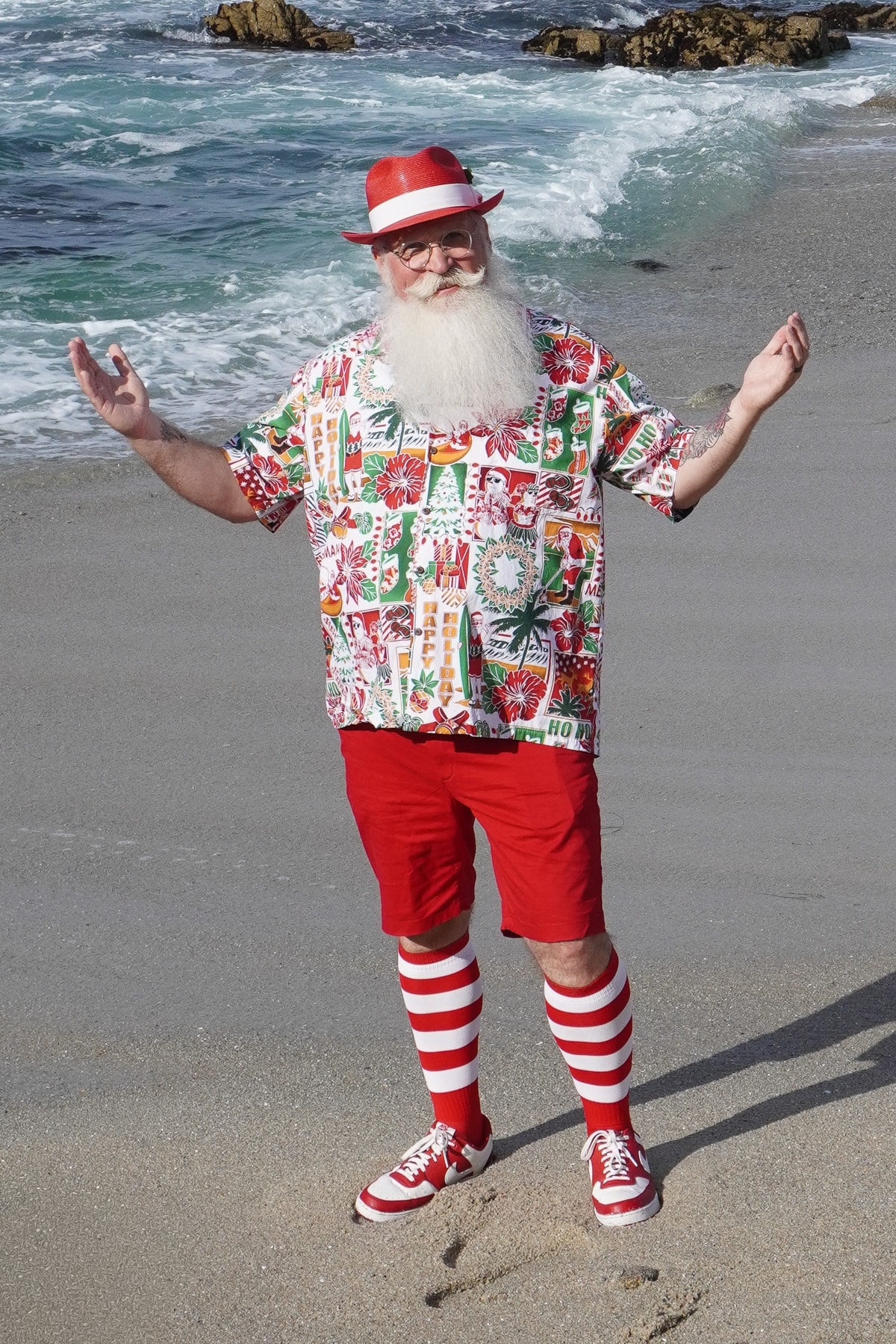 Santa at a summer birthday party with laughing children
